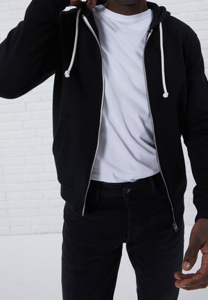 Tröja med dragkedja - black