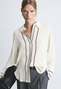 Mango Bluza s gumbima - off-white