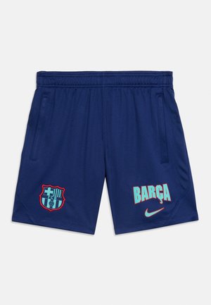 Short de sport bleu marine avec taille élastique, écusson du FC Barcelone sur la jambe gauche et inscription "BARÇA" avec logo Nike sur la jambe droite.