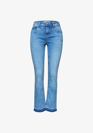 Light blue denim jeans with slight fading, bootcut legs, front button closure, and curved hem detail.