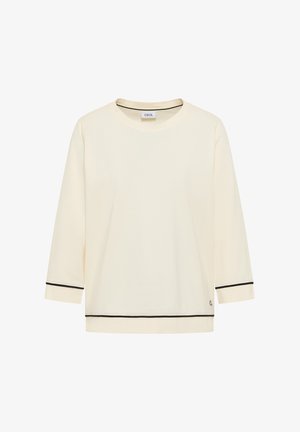 Crème langere mouwhemd met zwarte afwerking op de manchetten en zoom, ronde halslijn en merklabel "Cecil" binnenin de kraag.