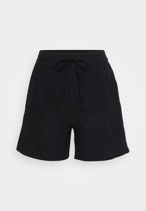 Svart linskjorts med elastisk midje, justerbar snörning og subtil vertikal tekstur. Løs passform, midt på låret.