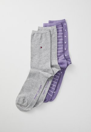 Three pairs of socks: one gray, one light purple with stripes, and one light purple with polka dots, all made from a soft fabric.