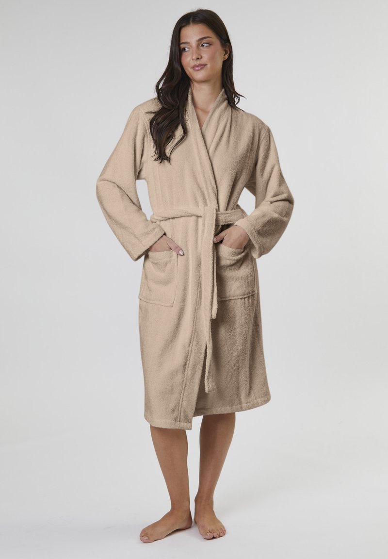 Beige bathrobe made of soft terry fabric, featuring long sleeves, a belted waist, and two front pockets. Simple, classic design.