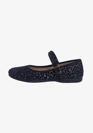 Black suede ballerina flats featuring a shiny, scattered glitter pattern, a rounded toe, and an adjustable strap with a small buckle.