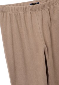 Beige ribbed katoenmix broek met een elastische tailleband, met een soepele textuur en subtiele stikaccenten.