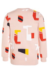 Rosa Sweatshirt mit einer Mischung aus abstrakten Formen in Rot, Gelb, Schwarz und Weiß. Mit dem Schriftzug "CALVIN KLEIN JEANS."