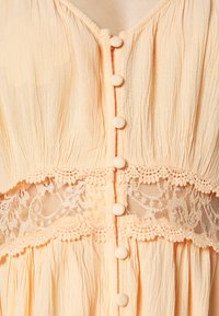 Yasrosalie Strap Ankle Dress Cream