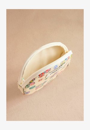 Sacca cosmetica con motivo floreale in tessuto crema, dotata di chiusura a zip, texture morbida e forma ovale compatta.