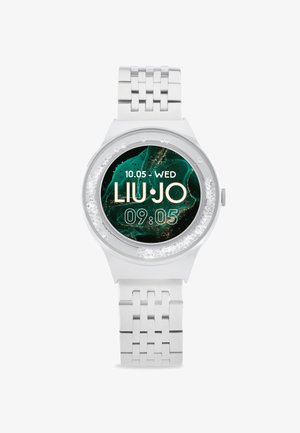 Silberne Analog-Uhr mit rundem Zifferblatt, das einen dunkelgrünen marmorierten Hintergrund, goldene Akzente und ein strukturiertes Metallarmband aufweist.