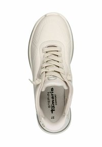 White sneaker with a smooth leather upper, round toe, flat laces, and padded tongue. Features textured insole and logo on the side.