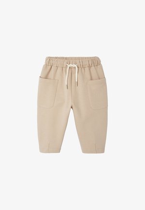 Beige Baumwoll-Sweatpants mit elastischem Bund, Kordelzug und zwei vorderen Taschen; schmal geschnitten und weicher Textur.