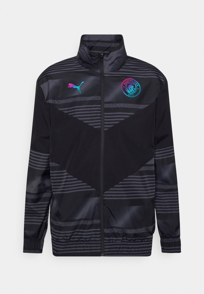 Black sports jacket with striped pattern, high collar, zip front, and Manchester City logo. Made of smooth, lightweight material.