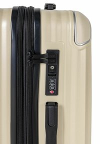 OCHNIK UNISEX beżowy