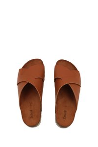 Brown leather slide sandals with crisscross upper design and smooth inner lining, featuring a flat sole and minimal embellishments.