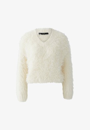 Cream-colored, fuzzy knit cropped sweater with long sleeves and a V-neck collar on a white background.