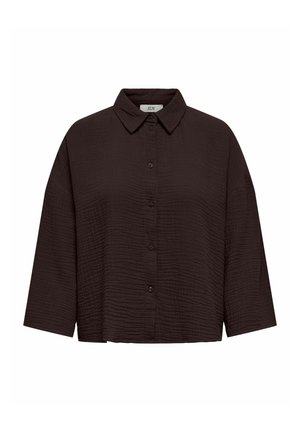 Zwarte cropped shirt van een textuurstof. Heeft een knoopsluiting aan de voorkant, een spitse kraag en brede driekwartmouwen.
