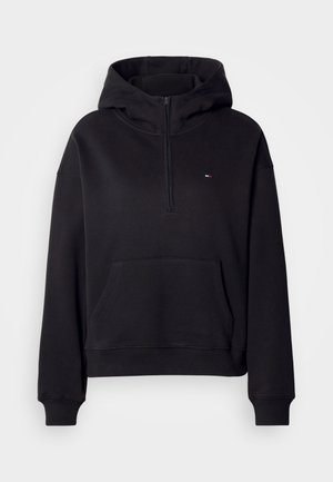 Felpa nera con zip realizzata in morbido misto cotone. Presenta una tasca frontale, polsini a coste e un emblema del logo sul petto.