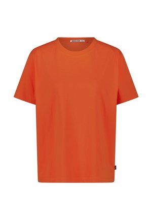 T-shirt orange vif à manches courtes en coton avec un col rond et une petite étiquette sur la couture latérale inférieure.