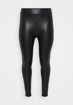 Leggings neri realizzati in un materiale liscio e lucido. Vita alta, design aderente e senza cuciture o motivi visibili.