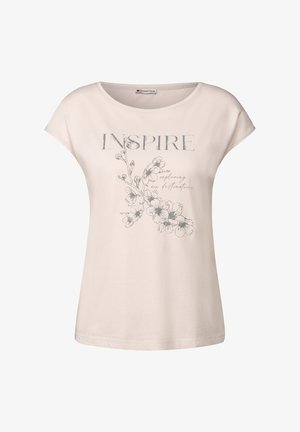 Camiseta de algodón color beige claro con cuello redondo, mangas de capucha y estampado floral. El texto dice "INSPIRAR" en letras grandes sobre gráficos de flores delicadas.