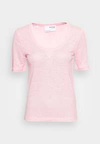 Light pink short-sleeve t-shirt with a scoop neckline, made from a soft, textured fabric. Features a relaxed fit and stitched hems.