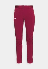 Pantalon de randonnée Marloon avec une ceinture flexible, des poches latérales zippées et des jambes fuselées ; fabriqué dans un tissu durable au toucher lisse.