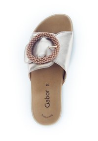 Sandals with a metallic silver textile upper, featuring a round, beaded accent. Beige insole with “Gabor” and “Best Fitting” branding.