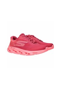 Sportschoenen in roze tinten met een textuur op de bovenkant, vetersluiting en een gewatteerde zool met meerdere ventilatiegaten.
