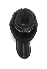 Black ankle boot featuring a plush fur collar, leather body, and decorative silver chain detail around the top edge. Flat sole.