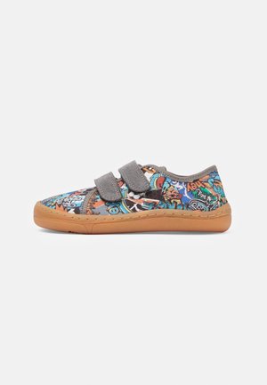 Chaussures pour enfants multicolores avec une tige en tissu texturé présentant des motifs de type graffiti, des bandes velcro grises et une semelle en caoutchouc beige.
