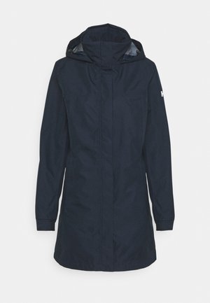 Marineblauwe lange jas met een capuchon, met een gladde stoffen textuur, voorzakken en een minimalistisch ontwerp. Gebogen zoom en verstelbare manchet.