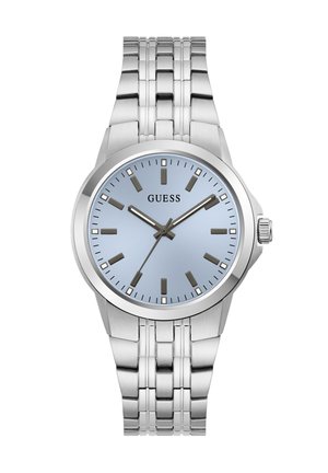 Ασημένιο μεταλλικό ρολόι Guess με ανοιχτό μπλε καντράν, σκούρα σημάδια ωρών και τρία δείκτες που δείχνουν 10:10:36.
