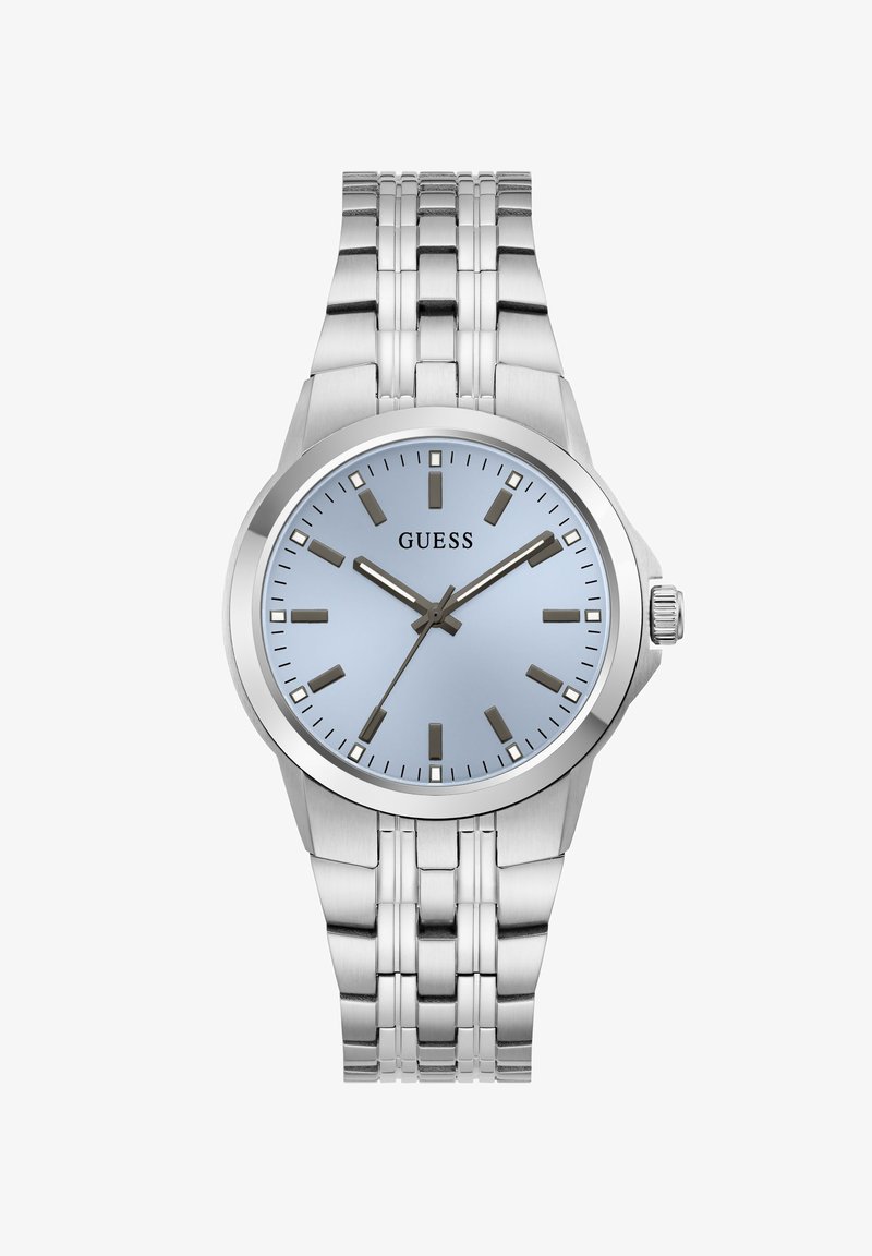 Ασημένιο μεταλλικό ρολόι Guess με ανοιχτό μπλε καντράν, σκούρα σημάδια ωρών και τρία δείκτες που δείχνουν 10:10:36.