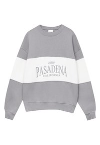 Sweat-shirt bicolore gris et blanc à manches longues avec "1991 Pasadena California" imprimé en grandes lettres sur le devant.
