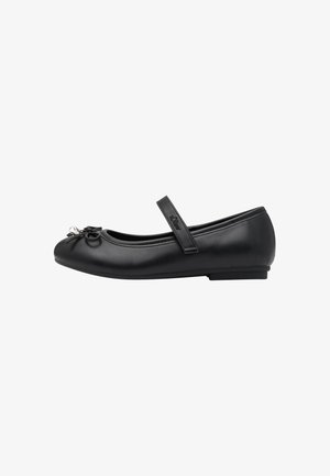 Ballerines en cuir noir avec un bout arrondi, un nœud décoratif à l'avant et une lanière sur le cou-de-pied. Semelle plate, texture lisse.