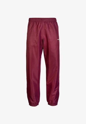 Bordeaux-trackpants gemaakt van een gladde, lichte stof, met een elastische tailleband en elastische boorden bij de enkels. Eenvoudig ontwerp met minimale details.