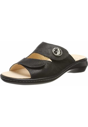 Black leather slide sandal with a rounded toe, open design, adjustable strap, decorative silver button, and low heel. Soft inner lining.