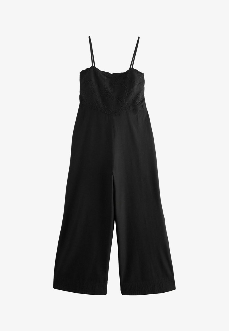 Mono negro con tirantes finos ajustables, con un patrón floral bordado en el torso y silueta de pierna ancha.