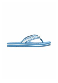 Blue and white striped Tommy Hilfiger flip-flop with cushioned sole and branded fabric straps.
