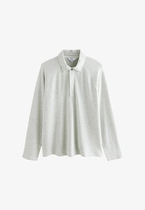 Light grey long-sleeve polo shirt with a ribbed collar, buttoned placket, and raglan sleeves. Soft fabric with subtle texture.