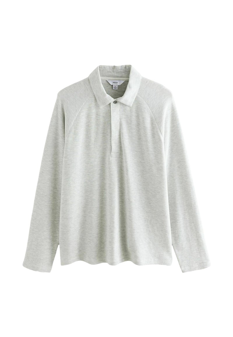 Lys grå langærmet polo t-shirt med ribbet krave, knaplukning og raglanærmer i et blødt, tekstureret stof.