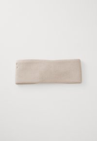 Beige fabric headband, rectangular shape, textured knit material with a smooth finish, featuring a simple design and no visible hardware.