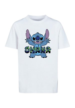 Hvid bomulds t-shirt med en blå tegneseriefigur med store ører og åben mund, omkranset af ordet "OHANA" i farverige bogstaver.