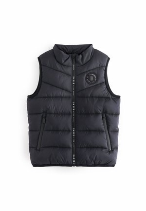Gilet rembourré noir avec un col haut, un matelassage vertical, une fermeture éclair à l'avant, un logo brodé et deux poches latérales zippées.