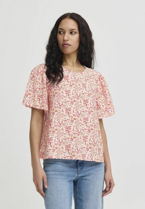 Haut à manches courtes à imprimé floral en rose clair et rouge, avec un col rond, une coupe décontractée et un tissu doux et texturé.