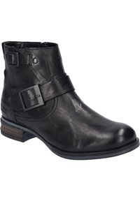 Bottine en cuir noir à bout rond, avec des sangles décoratives et des boucles, surface texturée et un petit talon en bois empilé.