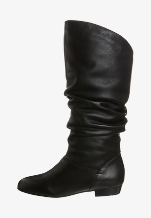 Black leather knee-high boot with a slouch design, rounded toe, and flat sole. Smooth texture with minimal stitching details.