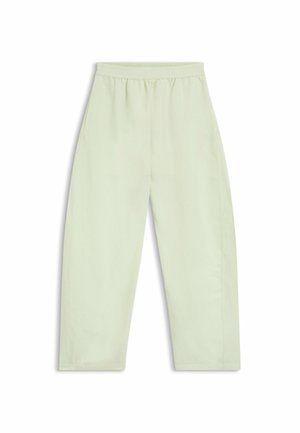 Luźne spodnie w jasnozielonym kolorze z elastycznym paskiem w talii i bocznymi kieszeniami, rozłożone płasko na białym tle.