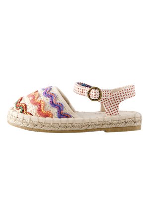 Beige vævet sandal med flerfarvet zigzag broderi, ankelrem med metalspænde og flet-jutesål med gummibund.